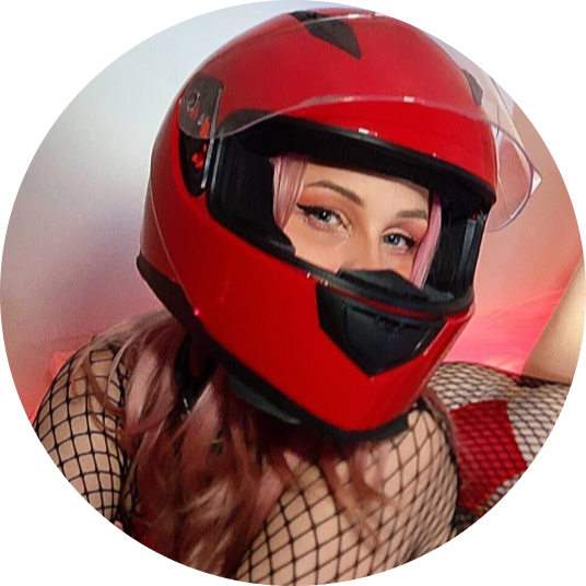 icetokki banner image ash blonde girl in early 20s playing with her hair in front of white brick background